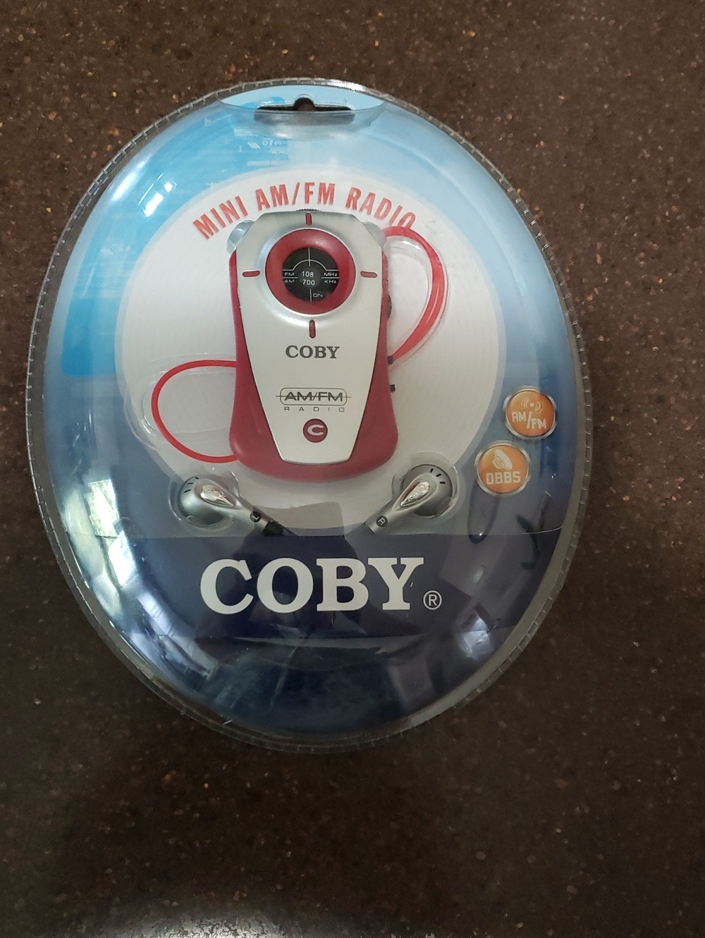 2005 Coby AM/FM Radio CX-71. New in package. Red